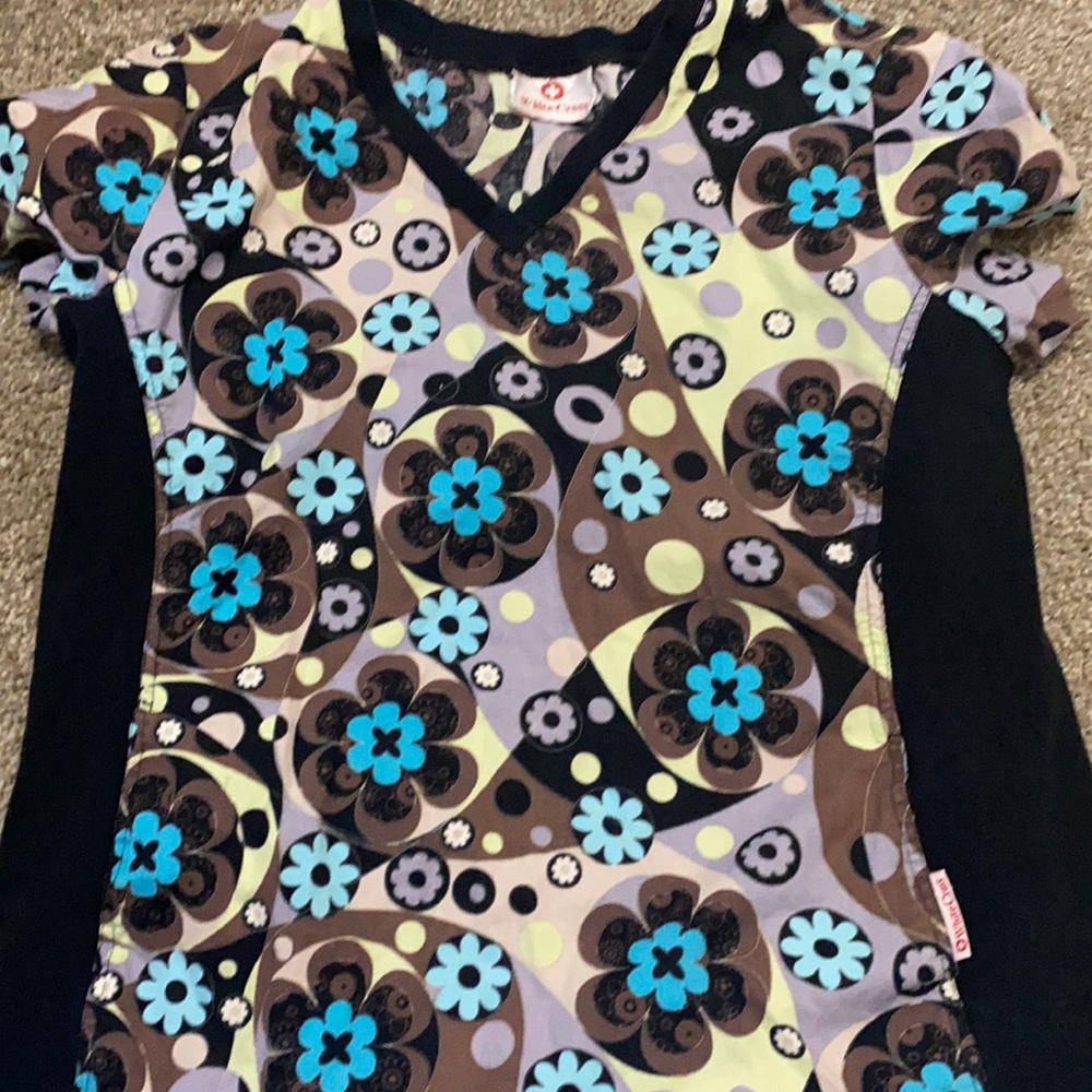 Scrub shirt paid $19.